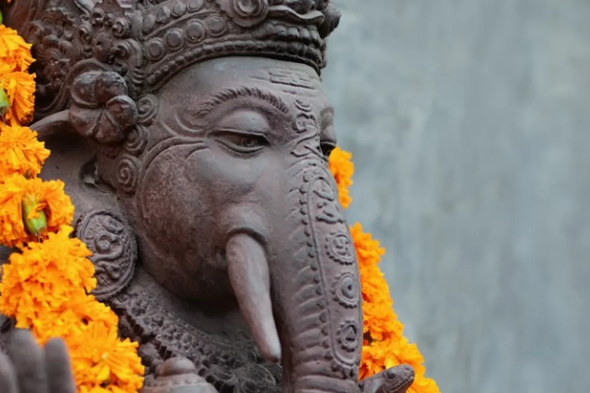 ganesha with balinese barong masks flowers necklace and ceremonial picture id683244782 150x150