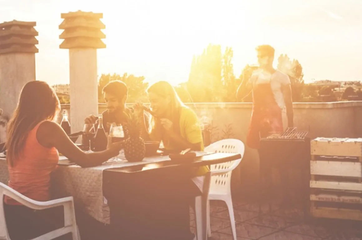 young friends having barbecue party at sunset on penthouse patio picture id1225966813 150x150